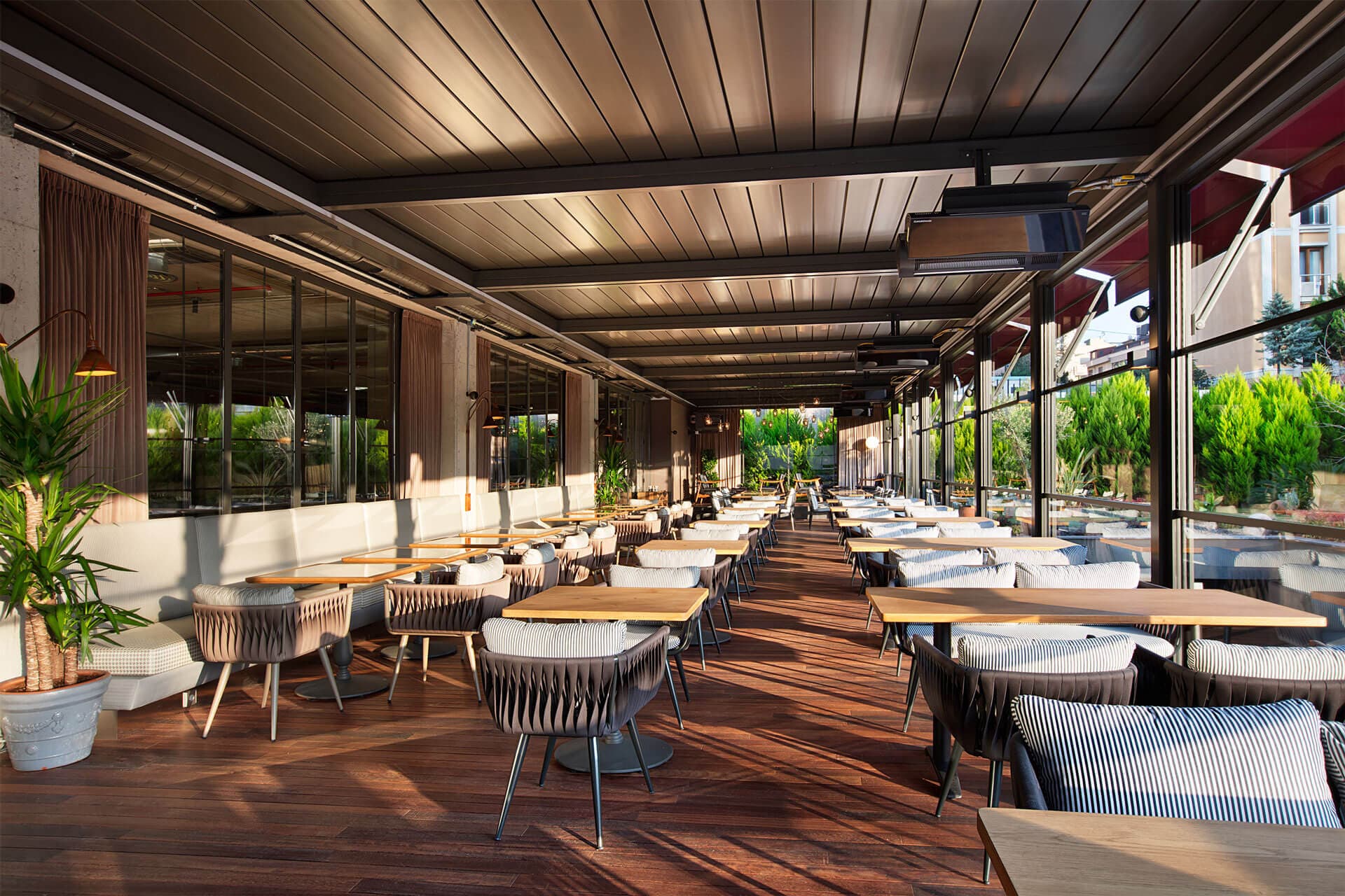 Commercial pergola and glass patio dining area
