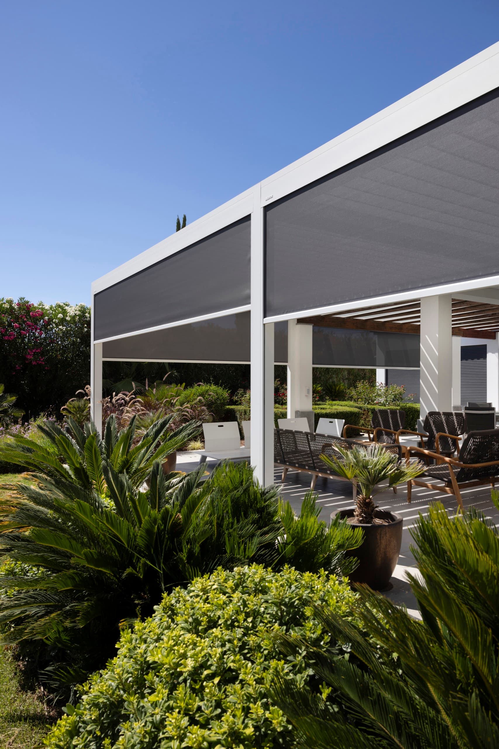 Deployed retractable patio screens